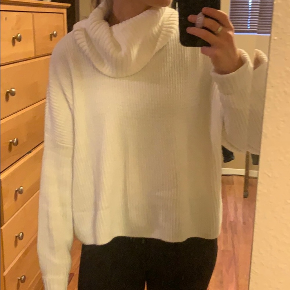 Cropped white turtleneck sweater